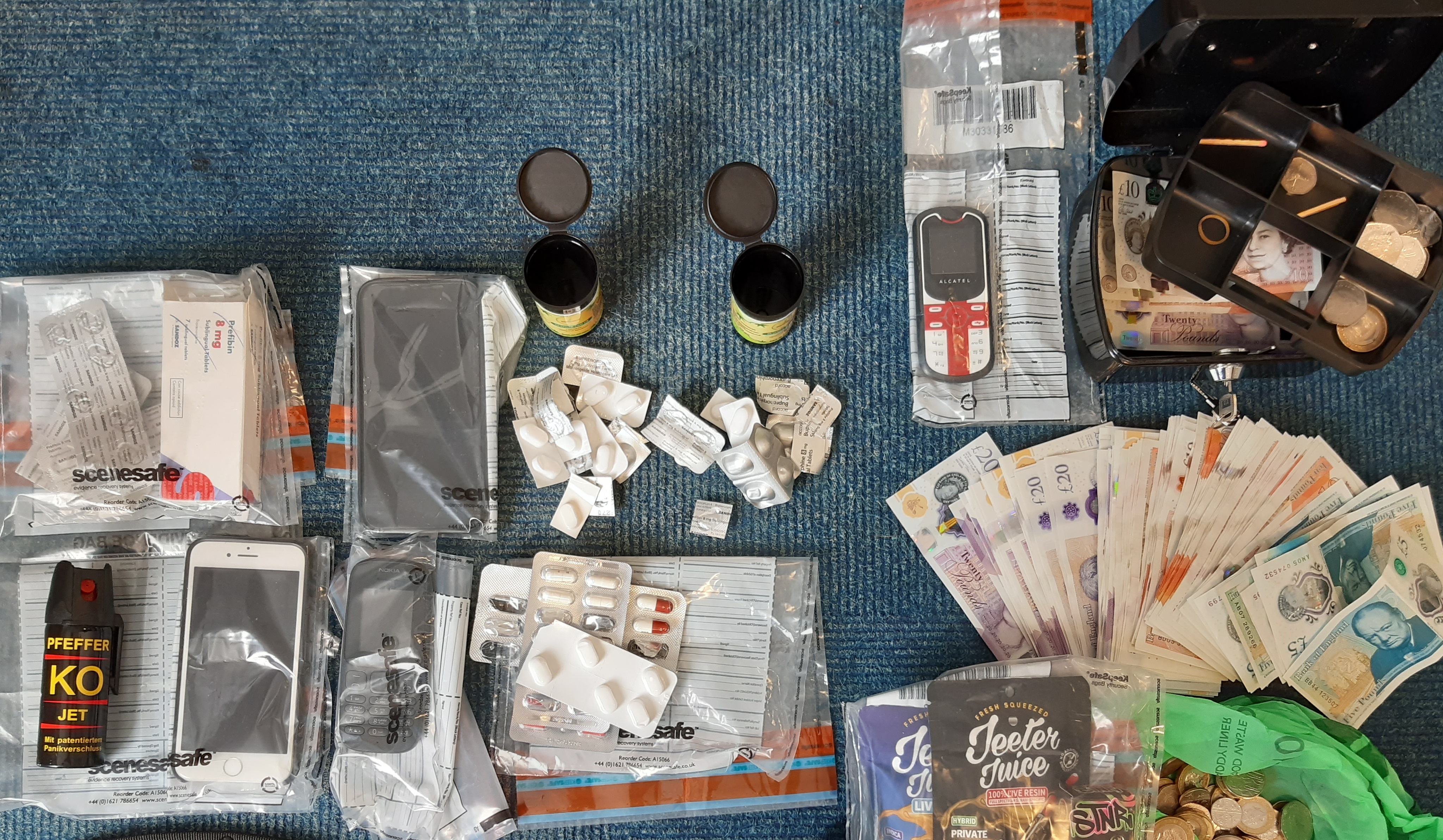 Officers seized drugs and weapons