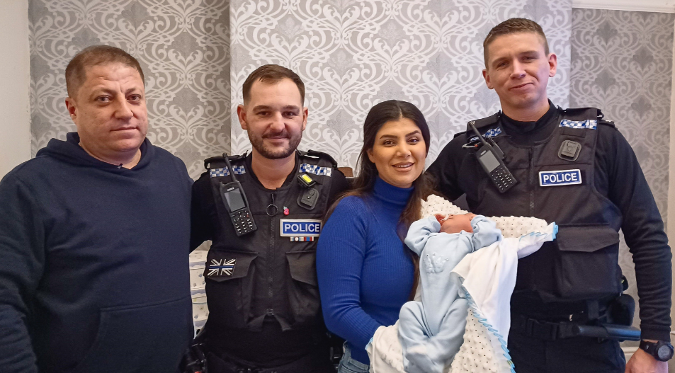 Officers reunited with baby and his parents