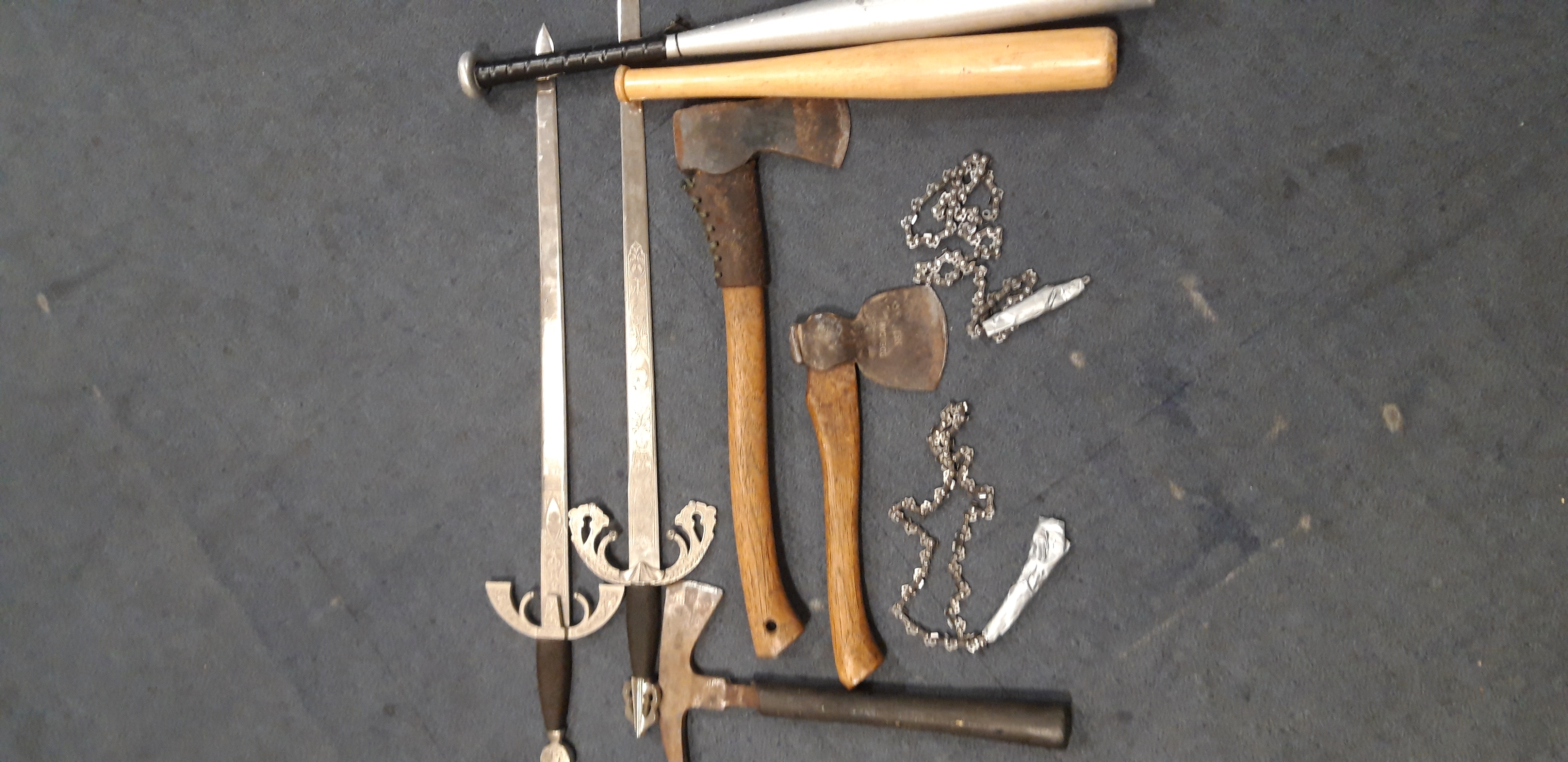 Officers seized drugs and weapons from the property