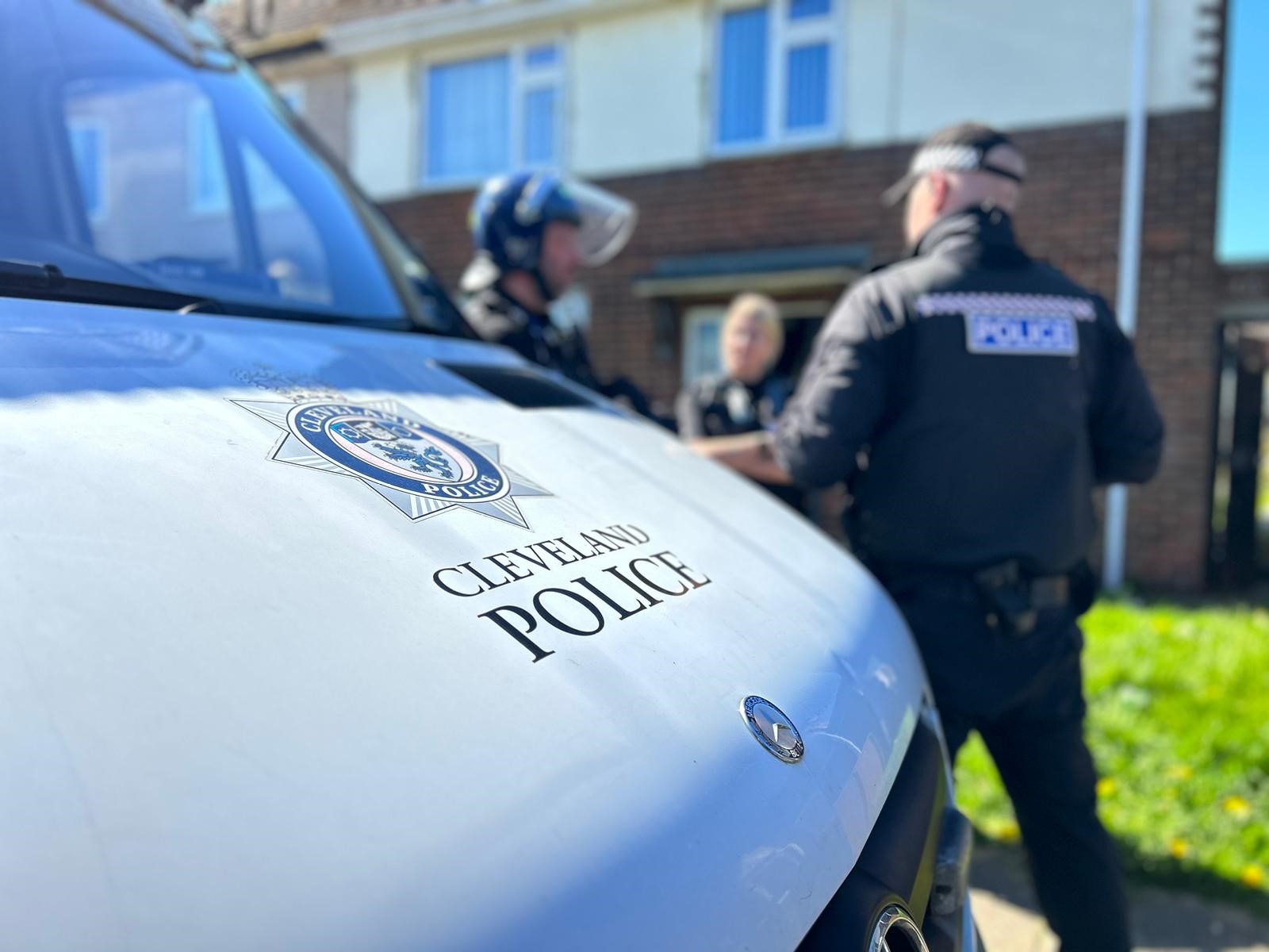 Police van and officers