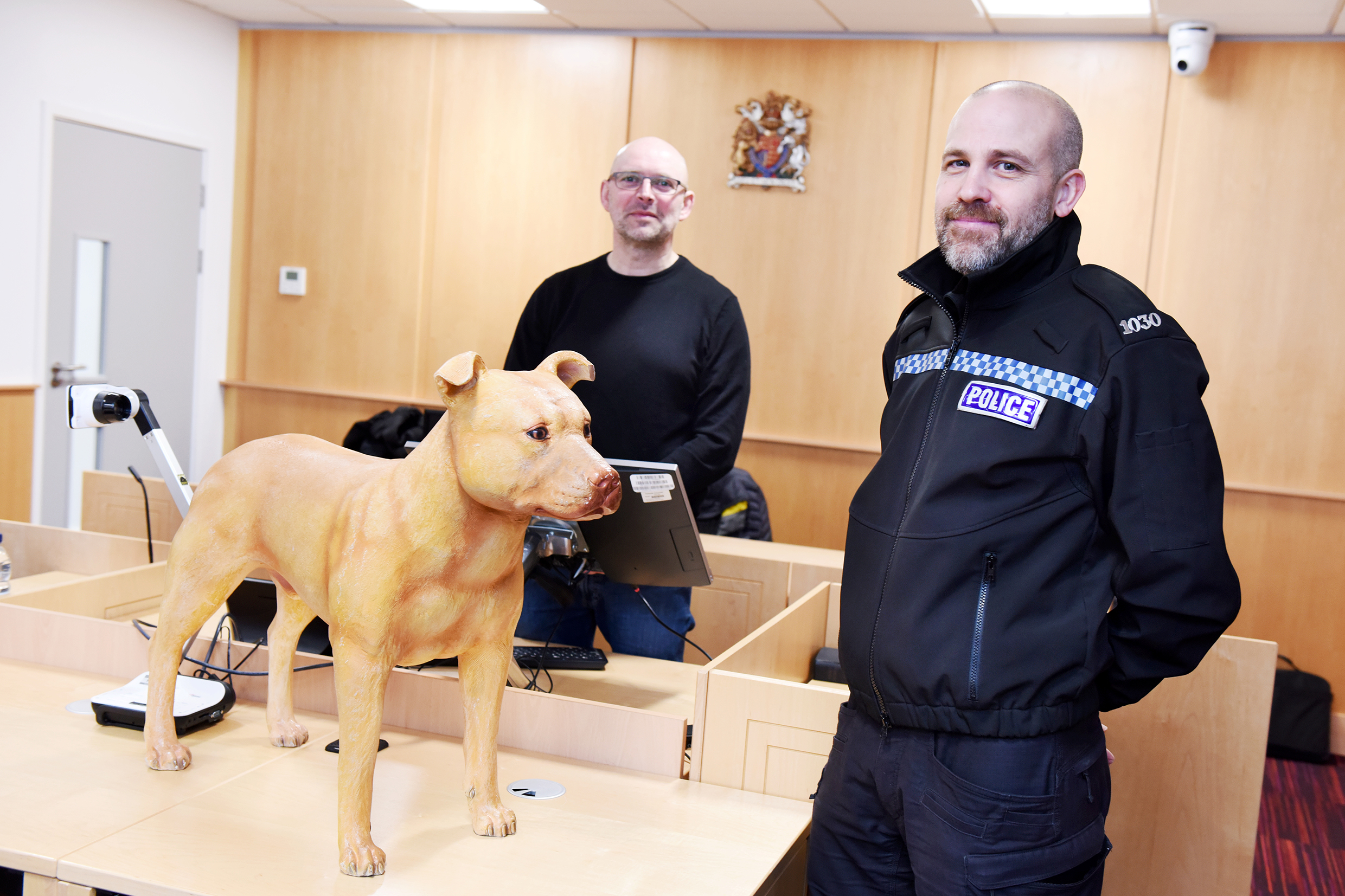 Police in mock court room
